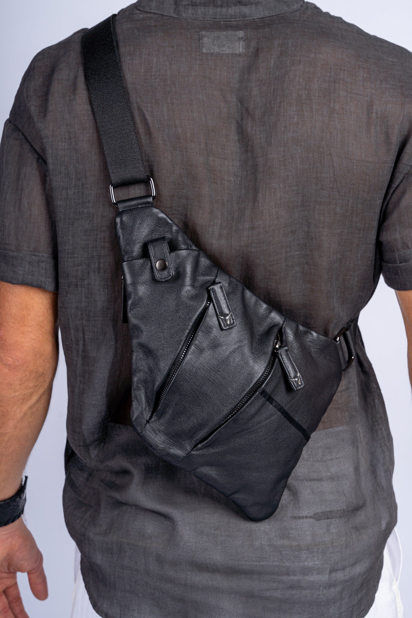 Kin, Pochette en Cuir